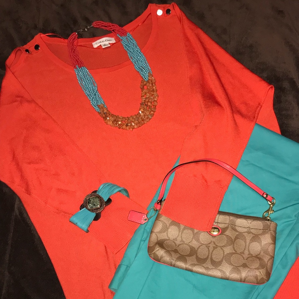 Calvin Klein open shoulder brunt orange top